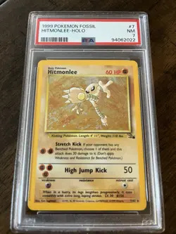1999 Pokemon Hitmonlee 7/62 Fossil Holo Rare PSA 7 - Image 1