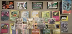 Pokemon 7 OK cards, 250 common, 3 coin, GX tag team slab, bad mini binder+more - Image 1