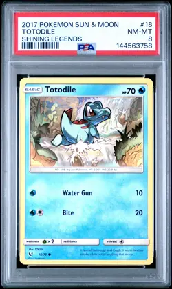 2017 POKEMON SUN & MOON SHINING LEGENDS #18 TOTODILE PSA 8 - Image 1