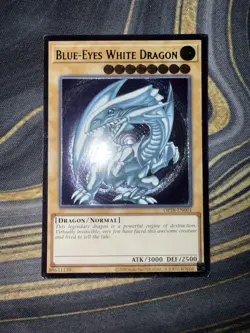 Blue-Eyes White Dragon, Ultimate Rare (OP28-EN001), Unlimited, Near Mint - Image 1