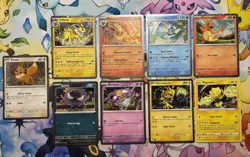 Pokemon Cosmos Holo Lot Of 9 NM Eevee w/swirl, Charmander, Vaporeon & More - Image 1