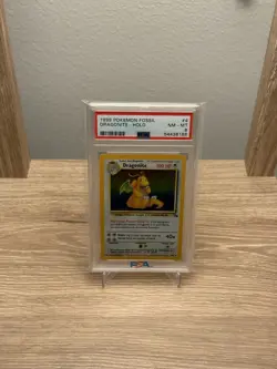 1999 Fossil Dragonite Holo Rare Pokemon Card 4/62 PSA 8 - Image 1