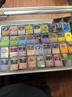Lot Of 34 Pokemon Cards From Prismatic Evolutions EX, Masterball, & Pokeball NM - Image 1