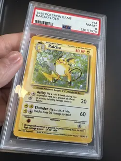 1999 POKEMON BASE SET UNLIMITED #14 RAICHU-HOLO PSA 8 - Image 3