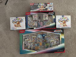 Pokemon Prismatic Evolutions Collection – PKC ETB + ETB + Figures + Bundles - Image 1