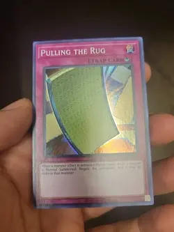Yugioh Pulling The Rug - Super Rare OP23-EN011 - Unlimited Mint - Image 1