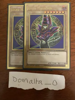 2x Yugioh Dark Magician MGED-EN002 1st Edition Premium Gold Rare Near Mint - Image 1
