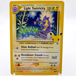 Pokemon TCG Light Toxtricity SWSH137 Cosmos Holo Celebrations Promo - Image 1
