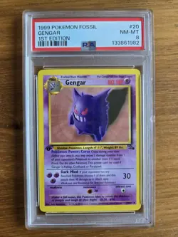 1999 POKEMON FOSSIL 20/62 GENGAR 1ST EDITION PSA 8 - Image 1