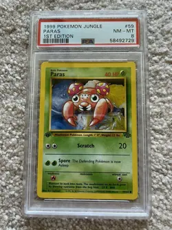 1999 Pokemon Jungle Paras 1st Edition 59/64 PSA 8 NM-MT - Image 1