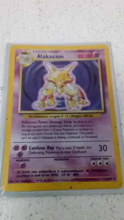 Pokemon Alakazam 1 102 Base Set Holo Rare Card with Sleeve - Image 1