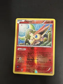 Pokemon Victini 23/113 Holo Basic 60 HP 30 Attack TCG Card - Image 1