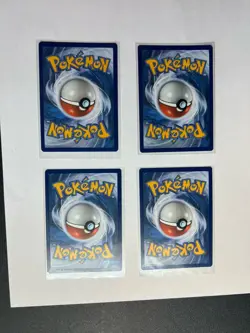 x4 Cosmog 013/025 - Celebrations - Holo Pokemon Card - Image 2