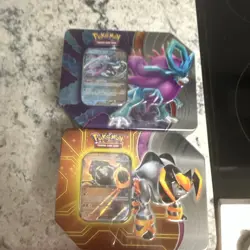 Pokemon TCG Paradox Destined Tin Iron Boulder & Walking Wake Booster Tins - Image 1