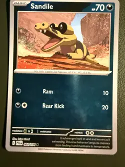 Pokemon TCG Sandile 64/94 ME2 Phantasmal Flames Reverse Holo NM - Image 1