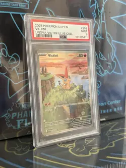 PSA 9 Victini 2025 Promo #208 Pokemon Unova Illustration Collection - Image 1