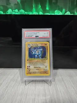 1999 Pokemon Game Base Set 1st Edition Machamp PSA 4 8/102 - Image 1