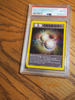 Pokemon 2002 Neo Destiny 1st Edition Miracle Energy holo card, PSA 8 - Image 1