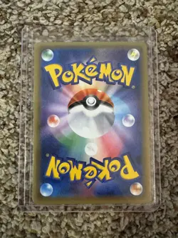 Cosmos Holo Brock's Gym Badge Pokemon Trainer Card Japanese Black Star Promo - Image 2