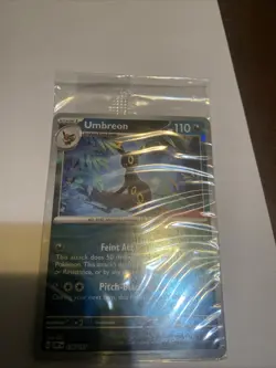 2023 Umbreon 130/197 Gamestop promo Pokemon Card Sealed English Stamped - Image 1