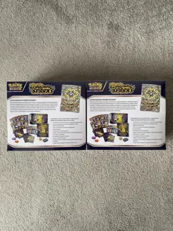 Pokemon TCG Surging Sparks Pokemon Center Factory Sealed ETB's x2 In Hand - Image 2