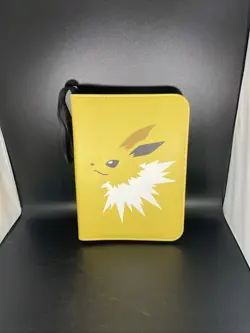 yellow Pokemon TCG card binder featuring the Electric-type Pokemon Jolteon - Image 1