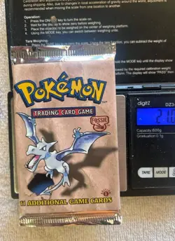 Pokemon Fossil 1st Edition Booster Pack (Scanned & Weighed) - Holo Raichu - Image 1