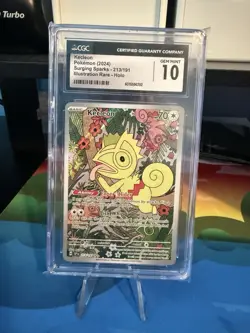 CGC 10 Kecleon 2024 Surging Sparks 213/191 Illustration Rare Pokemon Card - Image 1