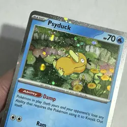 SWIRL Psyduck MEP 007 Black Star Promo Cosmos Holo 3-pack Blister NM - Image 1