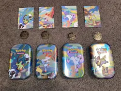 POKEMON TIN WITH ART CARD AND COIN SET OF 4 - Image 1