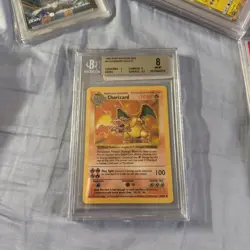 1999 POKEMON BASE SET SHADOWLESS #4 CHARIZARD HOLO BGS 8 - Image 1