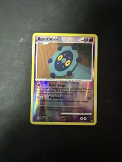 Pokemon - Bronzor - 55/100 - Common - Reverse Holo - Stormfront - Image 1