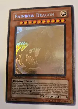YuGiOh Rainbow Dragon TAEV-EN006 1st Edition Ghost Rare LP - Image 1
