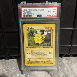 Pokemon 1999 Pikachu #60 1st Edition Jungle PSA 8 - Image 1