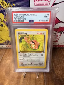 1999 POKEMON JUNGLE 1ST Edition 38/64 LICKITUNG PSA 9 - Image 1