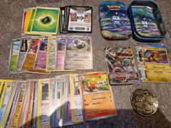 Pokemon Mini Tin With 50+ Card Including V/ex Or Higher And Coin - Image 1