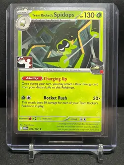 Team Rocket's Spidops 020/182 Cosmos Holo Pokemon 2026 Prize Pack Series 8 NM - Image 1