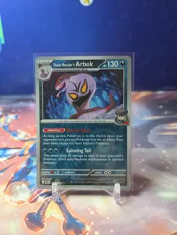 Team Rocket's Arbok SV10: Destined Rivals 113/182 Reverse Holo Pokemon TCG - Image 1