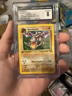 Pokemon Aerodactyl Fossil 1st Edition Prerelease Galaxy Star Holo CGC 8 - Image 1