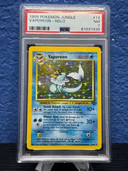 Vaporeon 12/64 Holo Rare Pokemon 1999 Jungle PSA 7 NM - Image 1