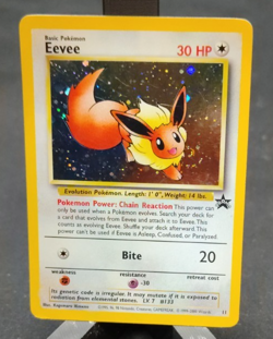 1999 Pokemon Eevee #11 Black Star Promo WOTC Holo Rare NM/LP Swirl - Image 1