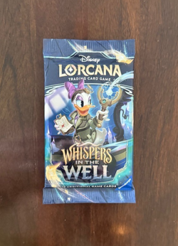 Disney Lorcana Whispers in the Well Booster Pack Sealed Gaston Daisy Magica Art - Image 1