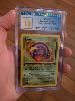 (POP 2) CGC 10 PERFECT 1999 Pokemon Fossil Ekans 1st Edition 46/62 WOTC Card - Image 1