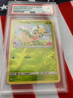 PSA Pokemon 2019 SUN & MOON DEERLING-REV.FOIL , COSMIC ECLIPSE #15 - Image 1