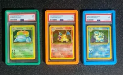 1999 Pokemon Base Set, PSA 7 Big 3! Venusaur #15, Charizard #4, & Blastoise #2 - Image 1