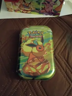 Pokemon TCG Prismatic Evolutions Full Set of 8 Sealed Mini Tins With Display - Image 2