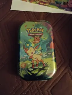 Pokemon TCG Prismatic Evolutions Full Set of 8 Sealed Mini Tins With Display - Image 5