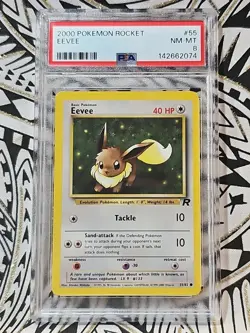 Eevee #55 1st Edition Team Rocket 2000 Pokemon PSA 8 Near Mint-Mint - Image 1