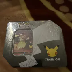 POKEMON TCG Celebrations 25th Anniversary - Lance's Charizard V Large Tin SEALED - Image 1