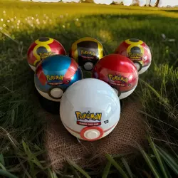 1 Costco Pokemon TCG Pokeball Tin with 3 Booster Packs- Random Ball - Image 1